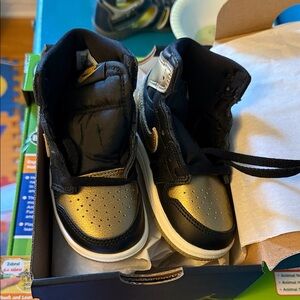 Nike Kids Black and Gold Sneakers